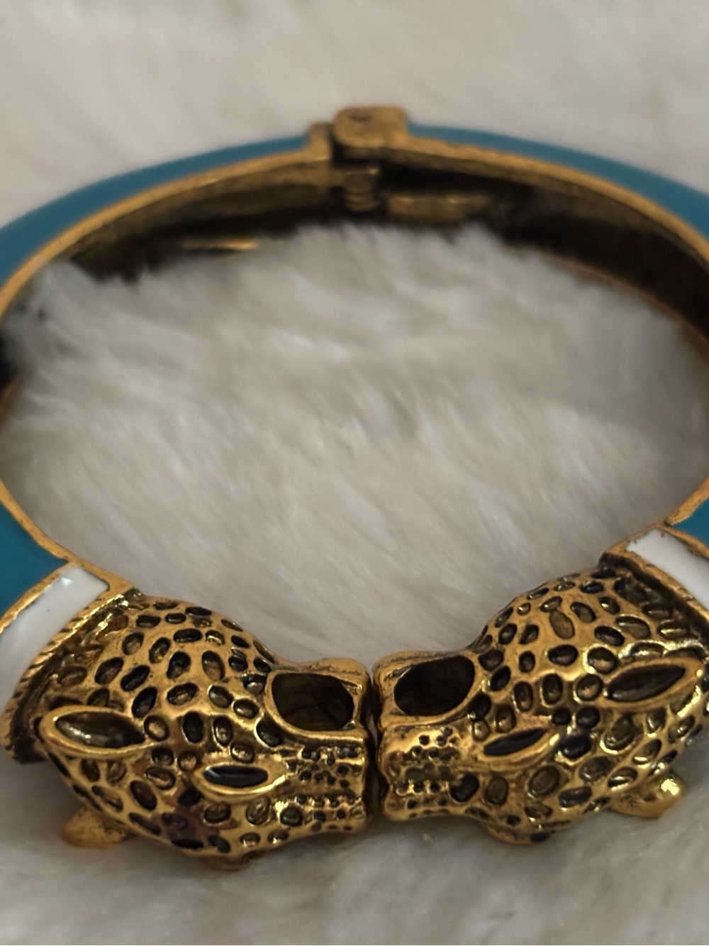 Gold-Tone Leopard Head Hinged Bangle Bracelet with Blue and White Enamel